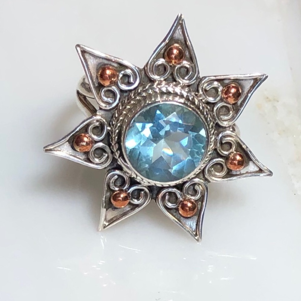Blue Topaz, Sterling and Rose Gold Ring. Stunning!
